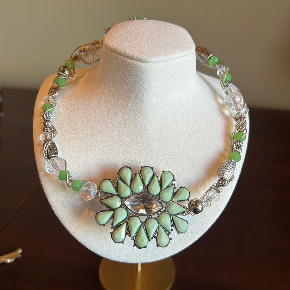 Statement necklace in light green tones